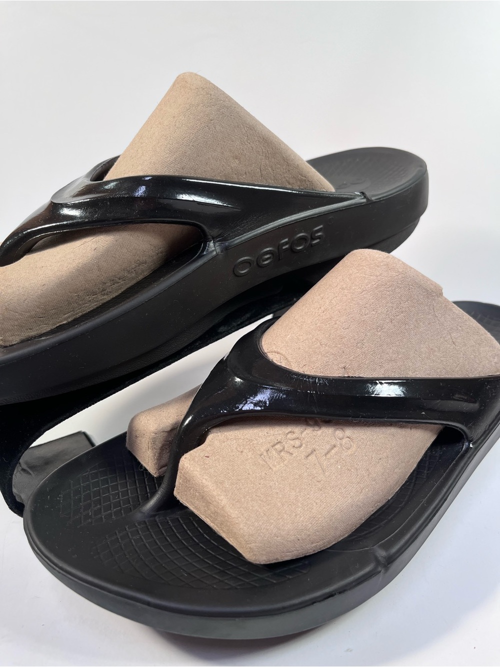 OOFOS OOlala Black Flip Flops
